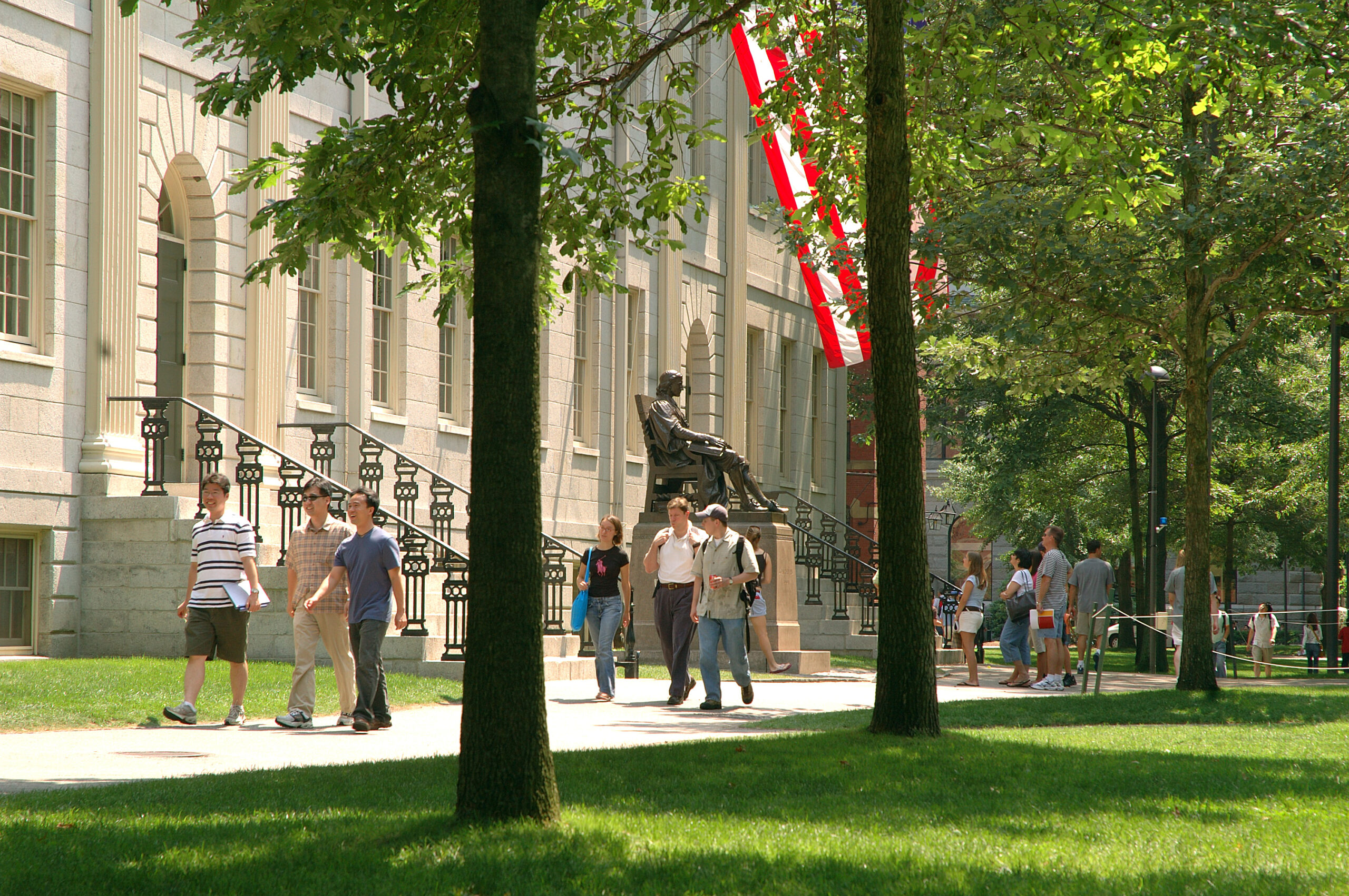 a group of students walking outside during the day