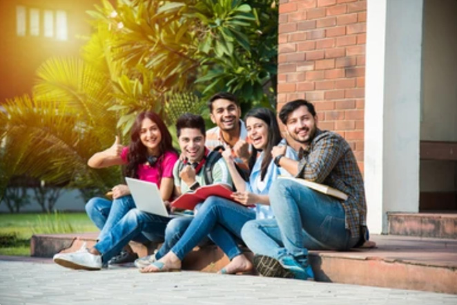 5 people smiling with their thumbs up